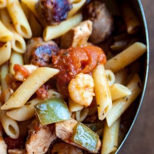 Inspired by Boston Pizza Jambalaya, this Penne Jambalaya is awesome and is a copycat of Boston Pizza's version. Shrimp, chicken, pasta, hot italian sausage, tomatoes and green peppers. What's not to love?