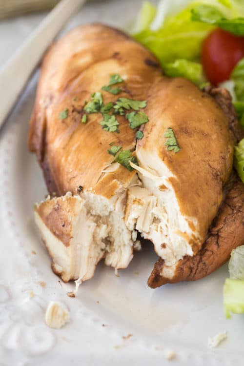 Chicken breast cut in half.