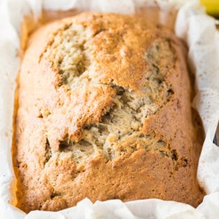 This simple banana bread recipe is an easy and delicious way to use up leftover bananas. It's a classic dessert recipe! It doesn't take much time in the kitchen to prepare either!
