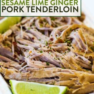 Shredded cooked pork tenderloin, garnished with lime.