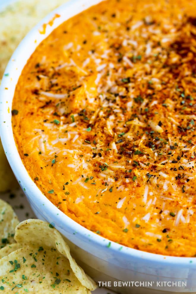 Hot buffalo chicken dip in a large white baker