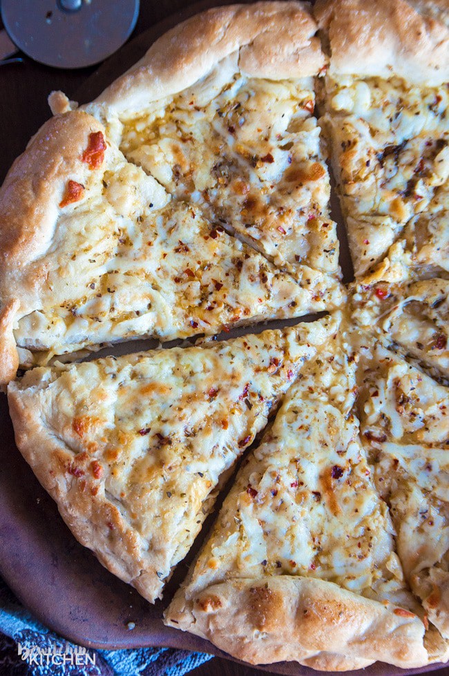 Italian Pizza Bread laying on a pizza stone.