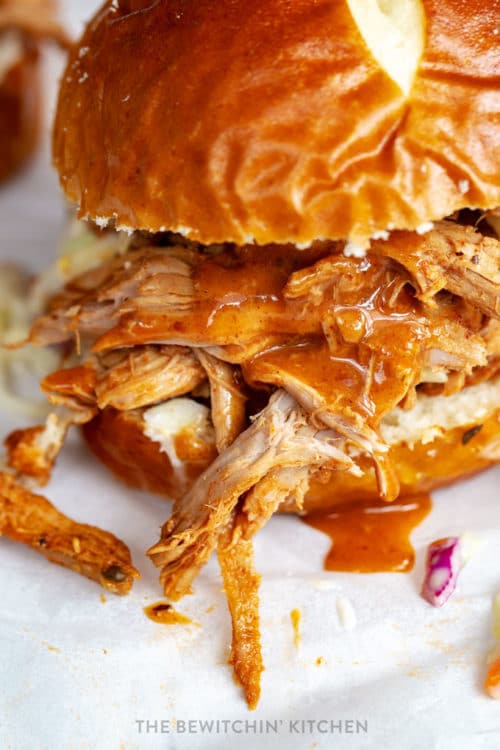 Close up of pulled pork with homemade bbq sauce dripping