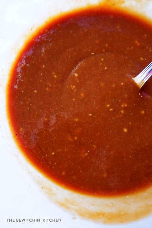 Easy ribs sauce: a mixture of herbs, dijon mustard, ketchup, and BBQ sauce.