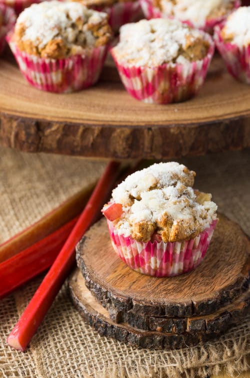 Whole wheat rhubarb muffins - these yummy muffins are the perfect spring or summer snack. Made with whole wheat flour, rhubarb, and greek yogurt. The crumb topping also features brown sugar Splenda.