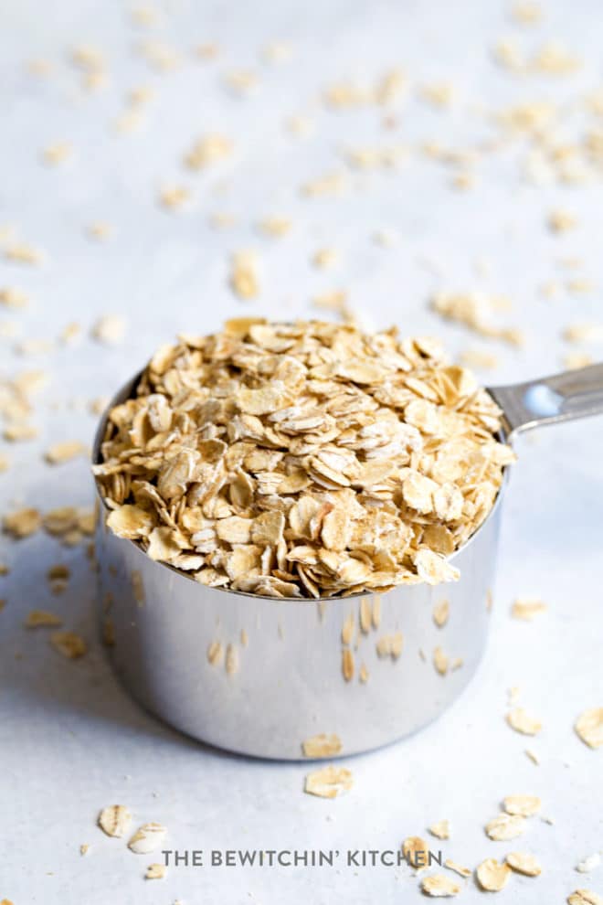 Old fashioned oats in a measuring cup to make homemade oat flour