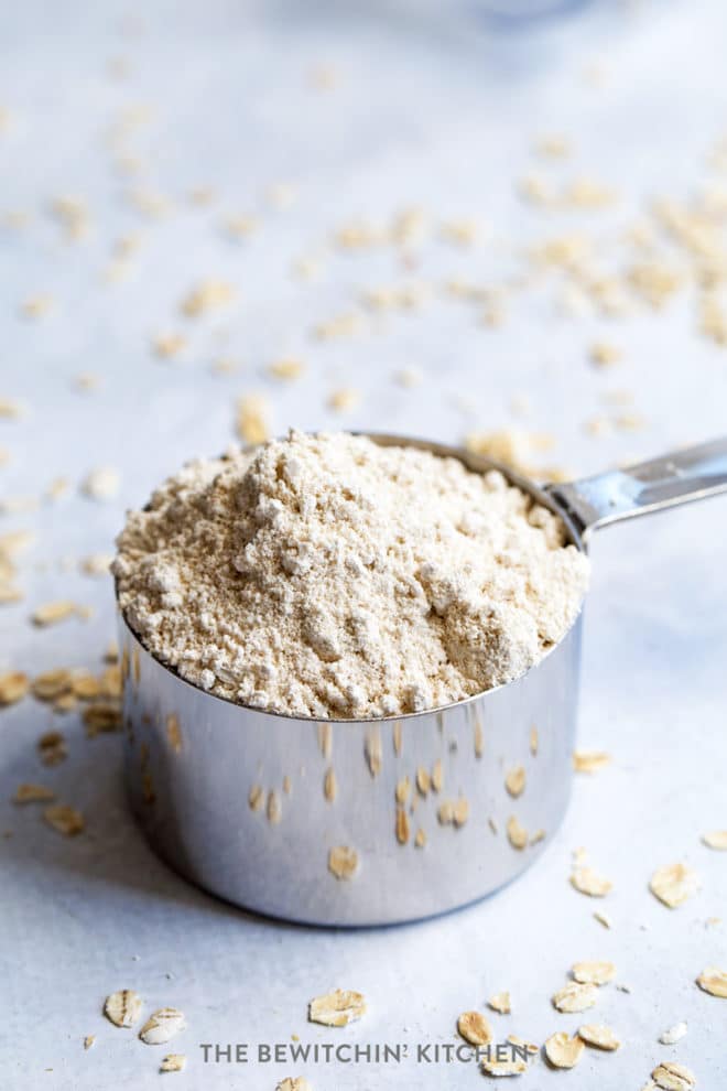 oat flour in a measuring cup