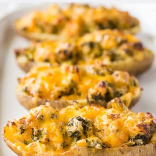 Broccoli ranch twice baked potatoes - this stuffed potato recipe is a twist on a classic recipe. Serve these at your next bbq or grill out!