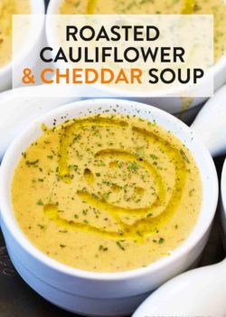 A bowl full of roasted cauliflower cheddar soup