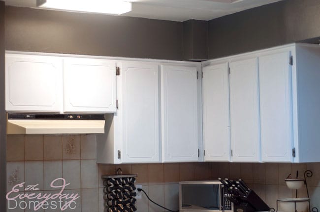  Transforming a 45 year old kitchen just by painting kitchen cabinets. This dated kitchen had old, oak cabinets that needed a little life. Products used: INSL-X Cabinet coat tinted in Benjamin Moore Chantilly Lace. Nothing like a little DIY renovation to spruce up kitchen cupboards..