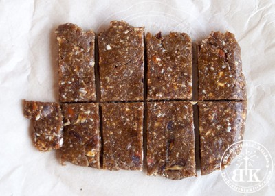 No Bake Coconut Bars - This recipe is gluten free, paleo, vegan, raw and grain free. If you looking for a homemade Lara Bars recipe, this is it! Get the recipe on The Bewitchin' Kitchen.