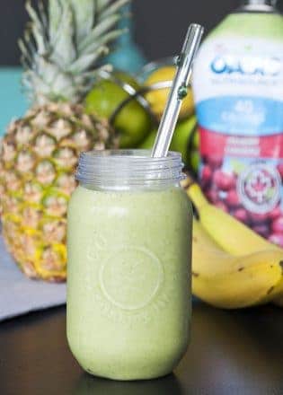 Tropical Power Smoothie - don’t let the green fool you. This power smoothie is loaded with antioxidants, vitamins and protein PLUS it tastes like a tropical vacation. | The Bewitchin’ Kitchen