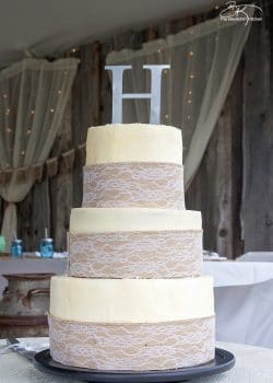 DIY wedding cakes. This three tiered diy wedding cake is fake on the bottom and top, with two vanilla lemon cakes in the middle. Wrapped with a burlap and lace trim for a rustic wedding feel. Here's how I did it.
