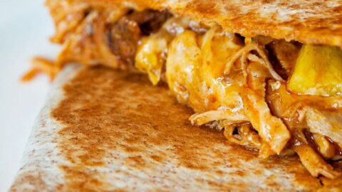 This pulled pork quesadilla is a delicious slow cooker recipe made with a mexican twist! | The Bewitchin' Kitchen
