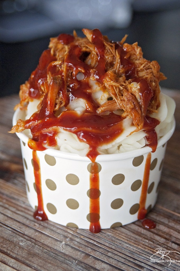 Well this is a fun play on food: Pulled Pork Sundae recipe. Whipped garlic potatoes, slow cooked pulled pork and tangy BBQ sauce. | The Bewitchin' Kitchen