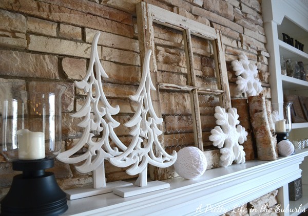 12 Enchanting DIY Christmas Decor Ideas: This winter mantel is the perfect example of elegance, using simple and clean elements. 