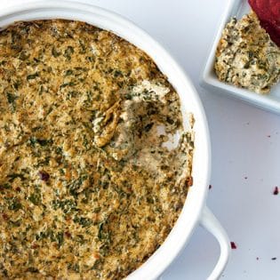 Cheesy BLT Kale Dip - This hot dip recipe is a delicious appetizer that's a party hit! Two of us cleaned the bowl faster than what I care to admit | thebewitchinkitchen.com