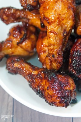 Sweet Sriracha Chicken Wings - this chicken wing recipe is the perfect blend of sweet and spicy. My husband asked me if he could go to the store, to buy more wings so I could make MORE of these tonight! Perfect for game day! | thebewitchinkitchen.com