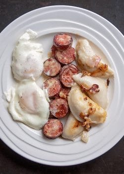 This Ukrainian Christmas Breakfast recipe is a Christmas morning tradition for my family. Perogies, ukrainian sausage, eggs and lots of cream. It's not the number 1 choice for weight loss, but it's the perfect cheat day meal. | The Bewitchin Kitchen