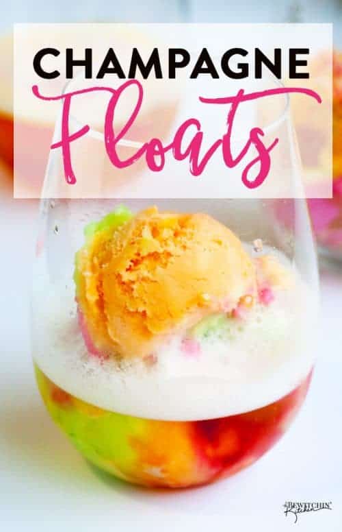 Picture of champagne float with orange and rainbow sorbet in wine glass