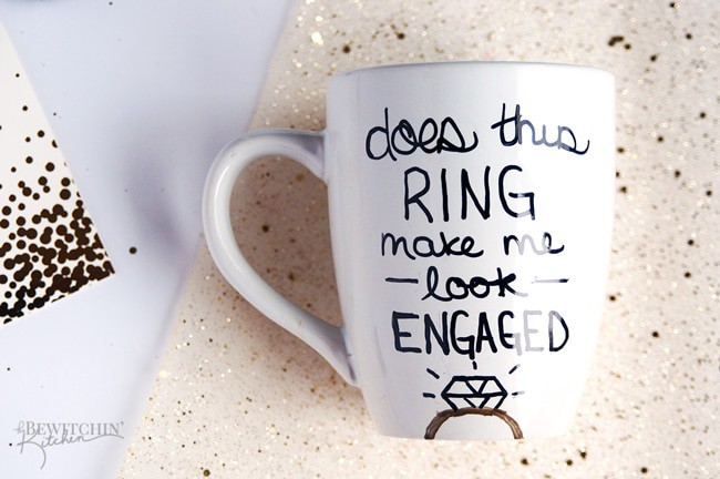 A simple and frugal DIY Engagement Gift idea! I love how easy this sharpie mug is plus the homemade gift comes from the heart. | thebewitchinkitchen.com