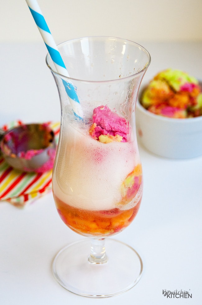 Unicorn Floats - This Unicorn Float recipe is the perfect kids dessert. I love how colorful it is and that' it's an easy dessert! The unicorn poop trend is fun for kids of all ages! | thebewitchinkitchen.com