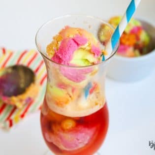 Unicorn Floats - This Unicorn Float recipe is the perfect kids dessert. I love how colorful it is and that' it's an easy dessert! The unicorn poop trend is fun for kids of all ages! | thebewitchinkitchen.com