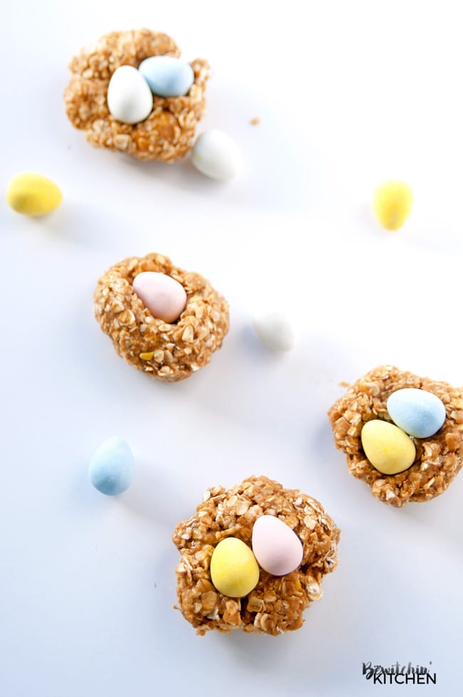 Nut Free Easter Nest Bites - this no bake dessert is such an easy recipe. Quick oats, brown rice syrup, candy coated chocolate eggs (Mini Eggs or Eggies) and sunflower seed butter. | thebewitchinkitchen.com