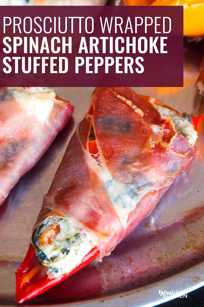 Spinach artichoke stuffed peppers wrapped in prosciutto. Add this to your appetizer recipes. Spinach dip, bell peppers, prosciutto - it sounds like heaven. It has a little kick from jalapenos too. The perfect party food recipe. | thebewitchinkitchen.com