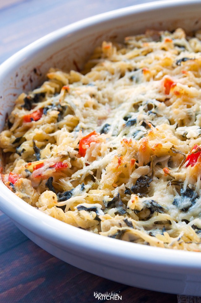 Spinach Artichoke Jalapeno Bake. This gluten free spinach artichoke pasta recipe is the ultimate comfort food. Mac and cheese meets spinach and artichoke dip, topped with parmesan and jalapenos. | thebewitchinkitchen.com