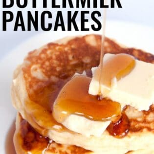 a stack of gluten free buttermilk pancakes with butter and maple syrup