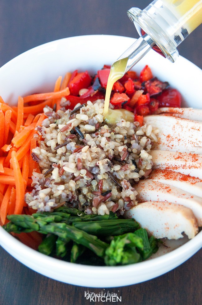 Spring Chicken Bowls with Honey Dijon Dressing - this healthy recipe makes the perfect lunch, snack or dinner. Loaded with roasted red pepper, grilled chicken breast, matchstick carrots, steamed asparagus, quinoa blend and topped with a healthy dressing. This recipe is 21 Day Fix approved. #chickendotca | thebewitchinkitchen.com