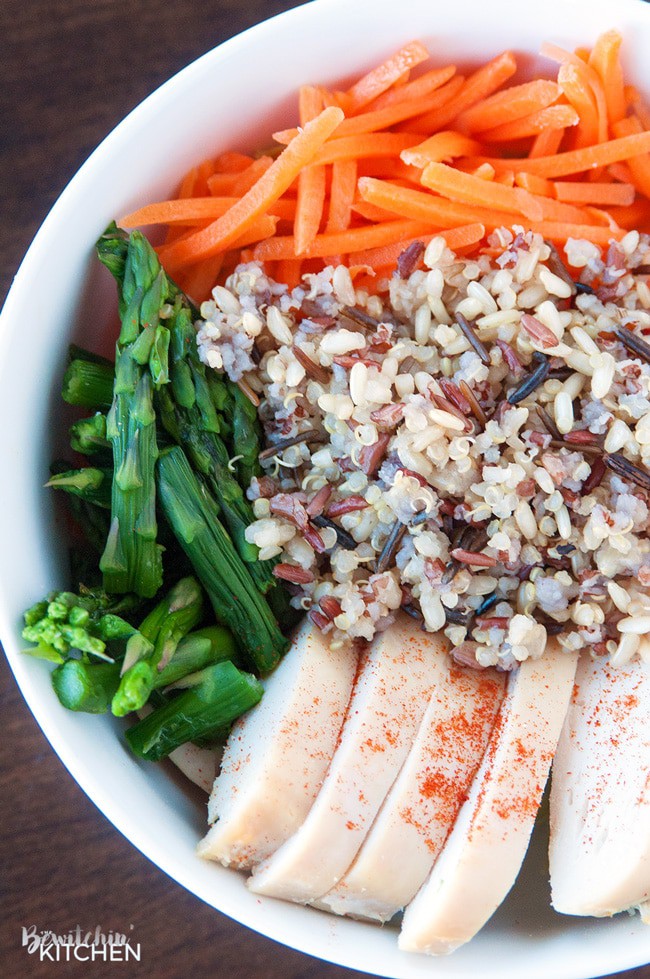 Spring Chicken Bowls with Honey Dijon Dressing - this healthy recipe makes the perfect lunch, snack or dinner. Loaded with roasted red pepper, grilled chicken breast, matchstick carrots, steamed asparagus, quinoa blend and topped with a healthy dressing. This recipe is 21 Day Fix approved. #chickendotca | thebewitchinkitchen.com