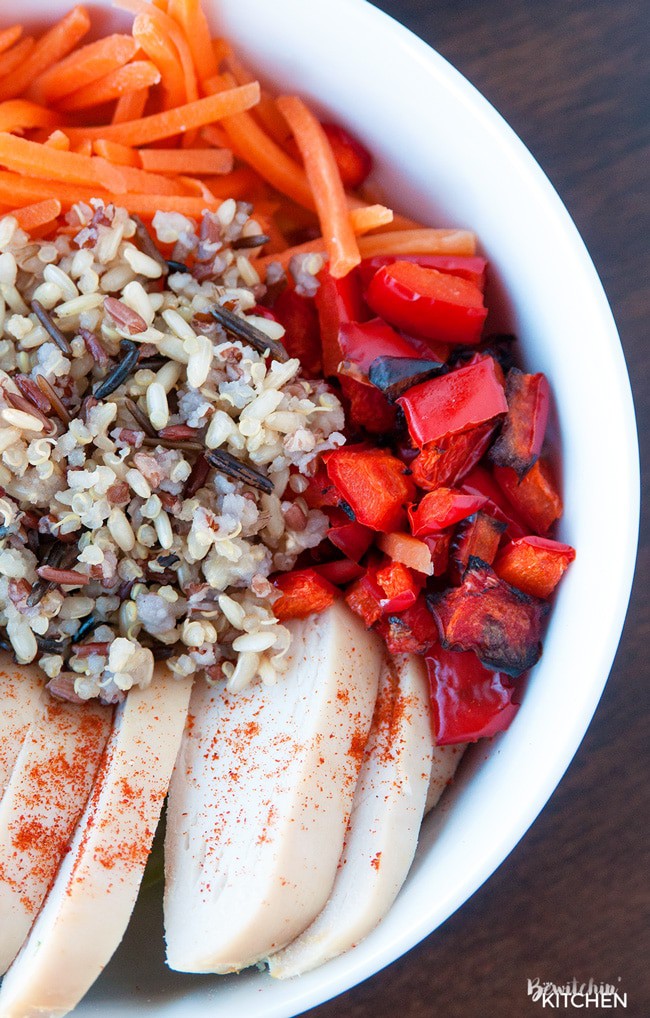 Spring Chicken Bowls with Honey Dijon Dressing - this healthy recipe makes the perfect lunch, snack or dinner. Loaded with roasted red pepper, grilled chicken breast, matchstick carrots, steamed asparagus, quinoa blend and topped with a healthy dressing. This recipe is 21 Day Fix approved. #chickendotca | thebewitchinkitchen.com