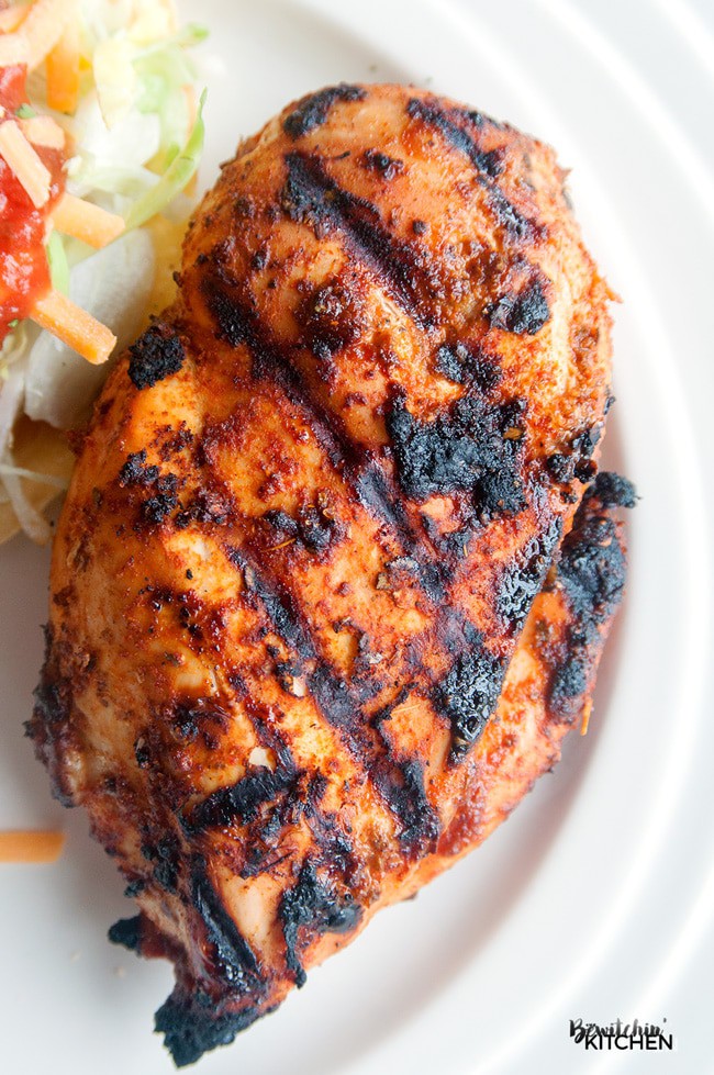 Try this recipe at your next BBQ! Barbecued Tex Mex Chicken, a healthy bbq recipe that is full on flavor! I love the southern flavors of chili, cumin and the twist with brown sugar. Serve with a tostada topped with lettuce, cheddar cheese, greek yogurt and salsa. PS - it's 21 Day Fix approved!