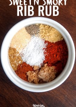 This sweet and smoky rib rub is perfect for summer bbq's. Not only is this great on ribs but it's super yummy on grilled chicken too. Try it the next time you barbecue! | thebewitchinkitchen.com