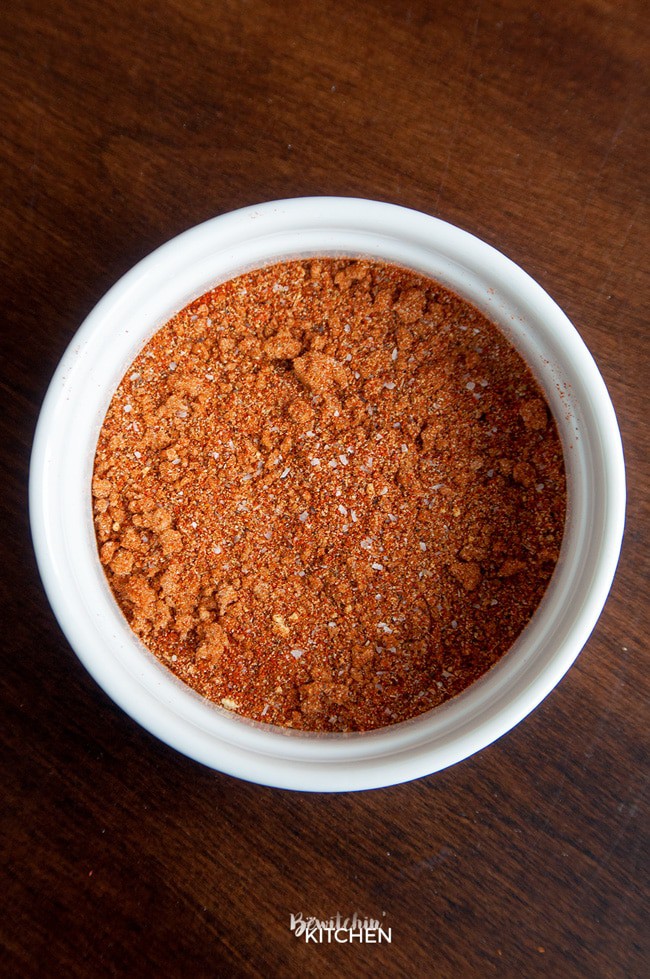 This sweet and smoky rib rub is perfect for summer bbq's. Not only is this great on ribs but it's super yummy on grilled chicken too. Try it the next time you barbecue! | thebewitchinkitchen.com