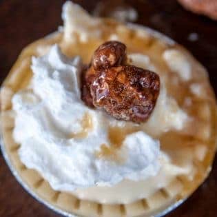 Whiskey Maple Cheesecake Tarts. This no bake boozy dessert recipe packs a bite. Canadian whiskey, maple syrup gives this creamy cheesecake a Canadian spin.