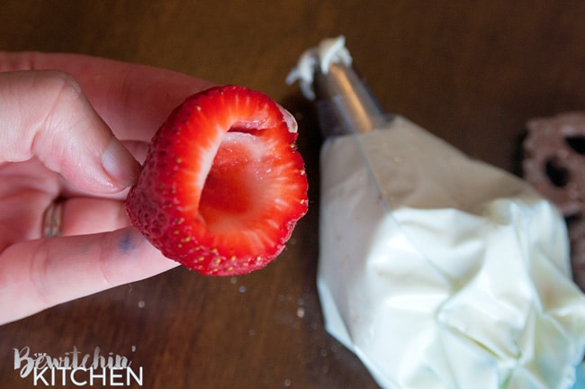 Cheesecake Stuffed Strawberries. This easy, no bake dessert recipe is a party favorite. Cream cheese, sugar and vanilla, topped with crunchy milk chocolate covered pretzels makes this bite sized treat sweet, salty and crunchy. Add this to your popular desserts board.