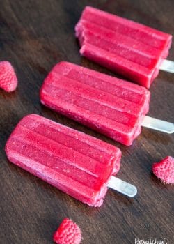 Berry and Beet Popsicles - don't let the hidden vegetable scare you. This homemade ice pop recipe is a refreshing and sweet way to beat the heat this summer. Picky eater approved!