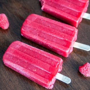 Berry and Beet Popsicles - don't let the hidden vegetable scare you. This homemade ice pop recipe is a refreshing and sweet way to beat the heat this summer. Picky eater approved!