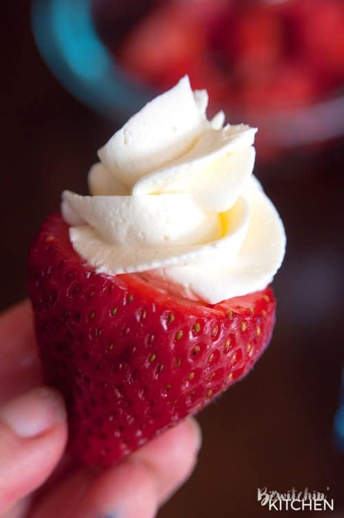 Cheesecake Stuffed Strawberries. This easy, no bake dessert recipe is a party favorite. Cream cheese, sugar and vanilla, topped with crunchy milk chocolate covered pretzels makes this bite sized treat sweet, salty and crunchy. Add this to your popular desserts board.