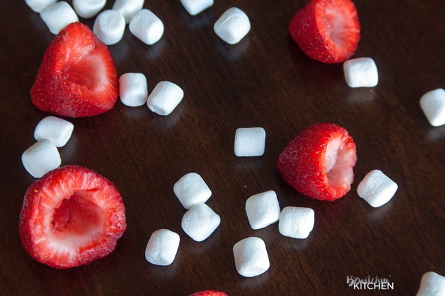 Smores Stuffed Strawberries. An easy dessert recipe that can be enjoyed around the campfire, bbq or all year long!