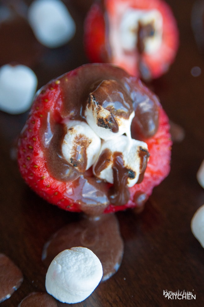 Smores Stuffed Strawberries. An easy dessert recipe that can be enjoyed around the campfire, bbq or all year long!