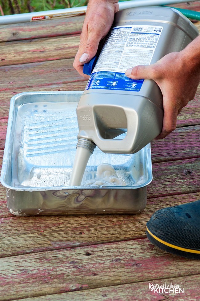 How to stain a deck in 4 easy steps. This DIY deck renovation uses Behr's Premium Deck Stripper, Wood Cleaner and Semi-Transparent Stain in Redwood Naturaltone. The before and after looks incredible!