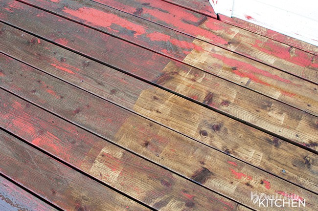 How to stain a deck in 4 easy steps. This DIY deck renovation uses Behr's Premium Deck Stripper, Wood Cleaner and Semi-Transparent Stain in Redwood Naturaltone. The before and after looks incredible!