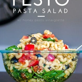 Pesto Pasta Salad - this tangy twist on a macaroni salad is my new favorite summer salad recipe. Sundried tomatoes, smart veggie pasta, spinach, feta cheese, red pepper, and olives tossed in a homemade honey pesto vinaigrette. Also makes a delicious and nutritious addition to a school lunch.