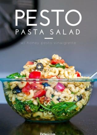 Pesto Pasta Salad - this tangy twist on a macaroni salad is my new favorite summer salad recipe. Sundried tomatoes, smart veggie pasta, spinach, feta cheese, red pepper, and olives tossed in a homemade honey pesto vinaigrette. Also makes a delicious and nutritious addition to a school lunch.