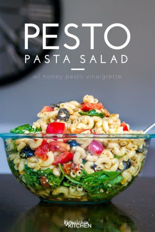 Pesto Pasta Salad - this tangy twist on a macaroni salad is my new favorite summer salad recipe. Sundried tomatoes, smart veggie pasta, spinach, feta cheese, red pepper, and olives tossed in a homemade honey pesto vinaigrette. Also makes a delicious and nutritious addition to a school lunch.