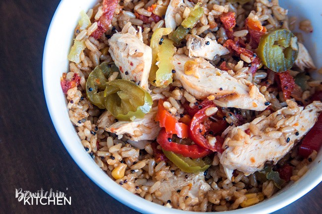 Quick and easy spanish rice bowls using grilled chicken, banana peppers, sundried tomatoes and Seeds of Change Spanish Rice.